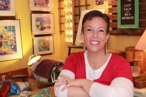 Amy Atwell, owner of The Painted Mermaid, in her shop. Photo by Kris Beasley