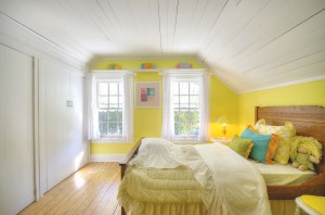 One of the two upstairs bedrooms. Photo courtesy of Yost and Yost, Intracoastal Realty, Inc. 