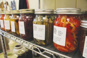 Veggies are picked fresh at Greenlands Farm and sold at the store, such as pickled okra and pickled Hungarian hot wax peppers. Photo by Bethany Turner