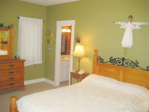 The master bedroom, which has views of Dutchman Creek. Photo courtesy of Kay Jolliff