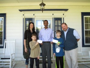 Left to right: Karen Bengel (mother), Sage Bengel, Providence Home's Executive Director Warren Mortley, Justice Bengel, and Board President Jamie Shoemaker. The Bengel brothers donated money received from their grandmother to Providence Home. Courtesy photo