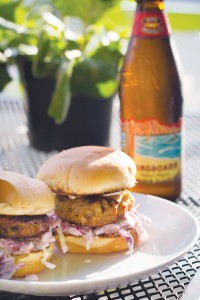 Homemade crab cakes—from Sheila Barbee's mother's recipe—are served on slider buns with a lemon-dill mayo and coleslaw. Photo by Drew Pearson