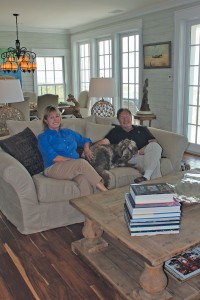 Amanda and Joaquin Carbonell at home with their Aussiedoodle, Turley. Photo by Bethany Turner