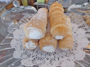 Creme horns rest on a doily awaiting the next guest of The Confectionary. Photo by Rebecca Jones