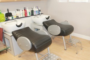  Ergonomic chairs and shampoo sinks relieve stress on the neck. Photo by Kris Beasley
