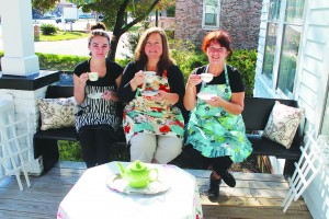 Owner Linda Pukenas (center) and full-time employees Kieri Cross (left) and Lesley Ann Bennett (right) run the Southport Tea House Tuesday through Saturday, 10 a.m. to 5 p.m.  Photo by Bethany Turner