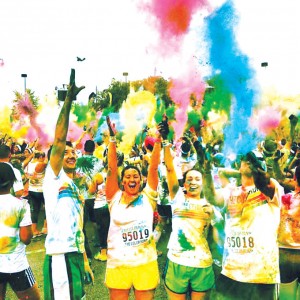 Our editor, Bethany Turner (second from left), ran the Color Run 5k in Washington, D.C. with her college roommate and their boyfriends as a fun way to encourage exercise. Photo by Hank Chavez