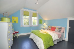 Another upstairs bedroom, with plenty of storage space in the closets. Photo courtesy of Yost and Yost, Intracoastal Realty, Inc. 