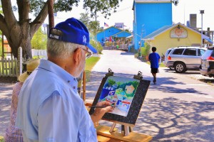 Jim McIntosh painting 'Eatery Row' at last September's Plein Air Paint Out. Courtesy photo