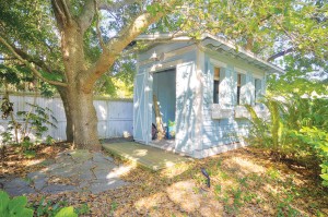 The backyard garden shed matches the home. Photo courtesy of Yost and Yost, Intracoastal Realty, Inc. 