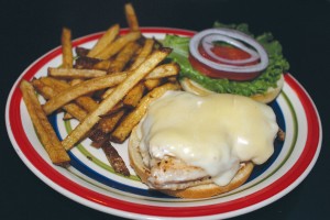 The Cape Fear chicken sandwich is smothered with crab dip and melted provolone cheese, served with hand-cut French fries.