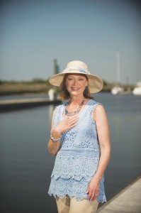 On model Maureen Panko: Hat by Cappelli, $17.98; scarf by Accent, $13.98; necklace and earrings by Arianna, $36.98; crochet overlay top by Noelle, $35.98; solid tank top by Noelle, $19.98; bracelet by Trezo, $11.98; all from Deborah's Place.