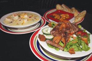 The Black and Bleu Salad features blackened steak on a bed of mixed greens, topped with veggies and bleu cheese crumbles (guests can opt for Vermont white cheddar). Try it with the red-wine vinaigrette, made fresh in-house.