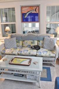 Their gray tabby, Leele, loves to lounge in the room as well. Photo by Bethany Turner