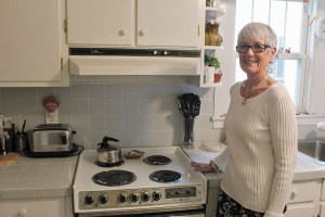 Mary Louise loves to cook, and when Bill can't get on the water, they often visit Haag's or Clem's for fresh seafood for Bill to grill, while his wife whips up the sides. Photo by Bethany Turner