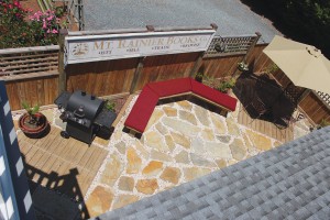 The backyard courtyard Keiffer added after the house was completed, seen from the top of the guest suite's exterior stairs. Photo by Bethany Turner