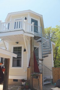 Exterior stairwell leading to the guest suite. Photo by Bethany Turner