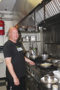 Stuart Sanders, Oasis' chef, favors the Voodoo Shrimp and the shrimp and grits dishes.