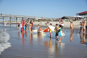 Surfer kids, ages 9 and under, prepare for the 'Guppies' heat during a past Oak Island Labor Day Surf Off. Photo by Jeff King