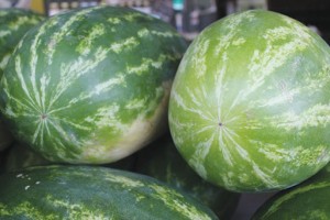 8. Watermelon Where to buy: Grocery stores and roadside produce markets or farms What to look for: Dark colors.  Stripes closer together. A yellow or light bottom. Don't buy if: The stem is green. Has an irregular shape.