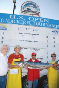 John E. Lewis (far left), aboard Second Chanze of Morehead City, NC, caught the first-place-winning king mackerel in the 2013 tournament. His fish weighed 47.05 pounds, and Lewis took home $25,000 plus a copper trophy. Courtesy photo