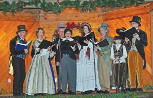 Oakwood Waits carolers from Raleigh, NC, perform at the 2013 Charles Dickens Christmas Festival. Photo by Frank Aaron 