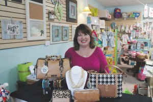 Penny Watkins founded Boo & Roo's in Southport because she loves working in retail and getting to know her customers as friends. Photo by Kris Beasley