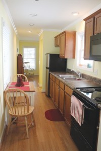 The galley kitchen in the guest suite offers plenty of modern comforts. Photo by Bethany Turner