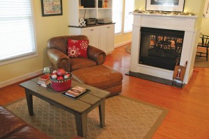 The free-standing, double-sided gas fireplace was an addition by craftsman Blair Deale during the 2011 renovation. Photo by Bethany Turner