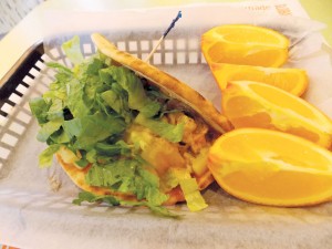 The Caribbean Luau flatbread from Tropical Smoothie Café is made with chicken, low-fat mozzarella cheese, pineapple, romaine lettuce, and Jamaican jerk sauce. Photo by Rebecca Jones