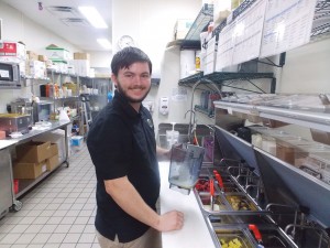 mployee David Smothers fixes up a custom smoothie in the kitchen. Photos by Rebecca Jones