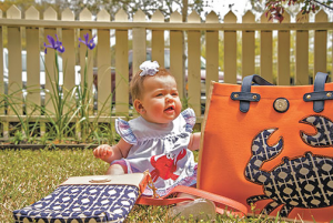 baby with bags